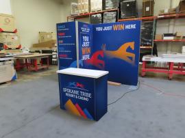 GK-1016 Gravitee Modular Exhibit with SEG Fabric Graphics, SuperNova Lightbox, Monitor Mount, Locking Closet Storage, and GOD-1557 Counter with Locking Storage -- View 2